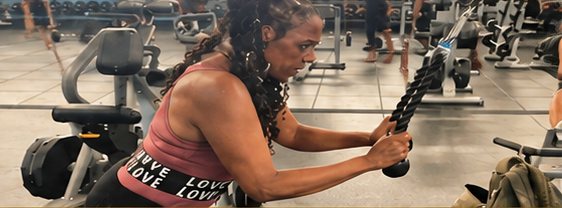 Jacqueline Gaffney training with a cable rope in the gym